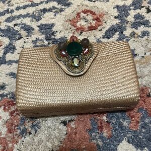 Elegant Gold Clutch with Jewel Embellishments